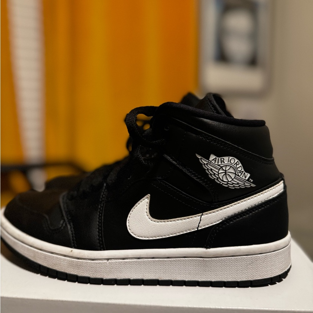 Nike Air Jordan Black and White High-Top Sneakers
